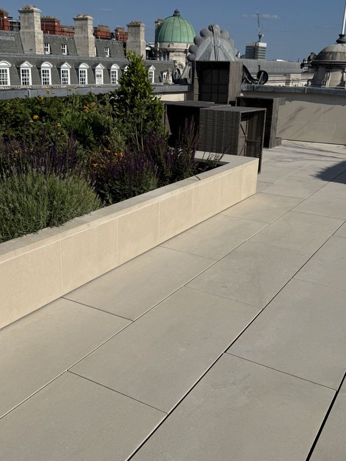 Freshly cleaned rooftop terrace paving and planters
